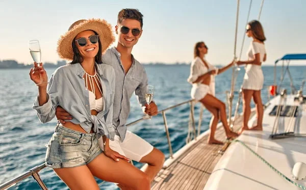 depositphotos_416196484-stock-photo-group-friends-relaxing-luxury-yacht